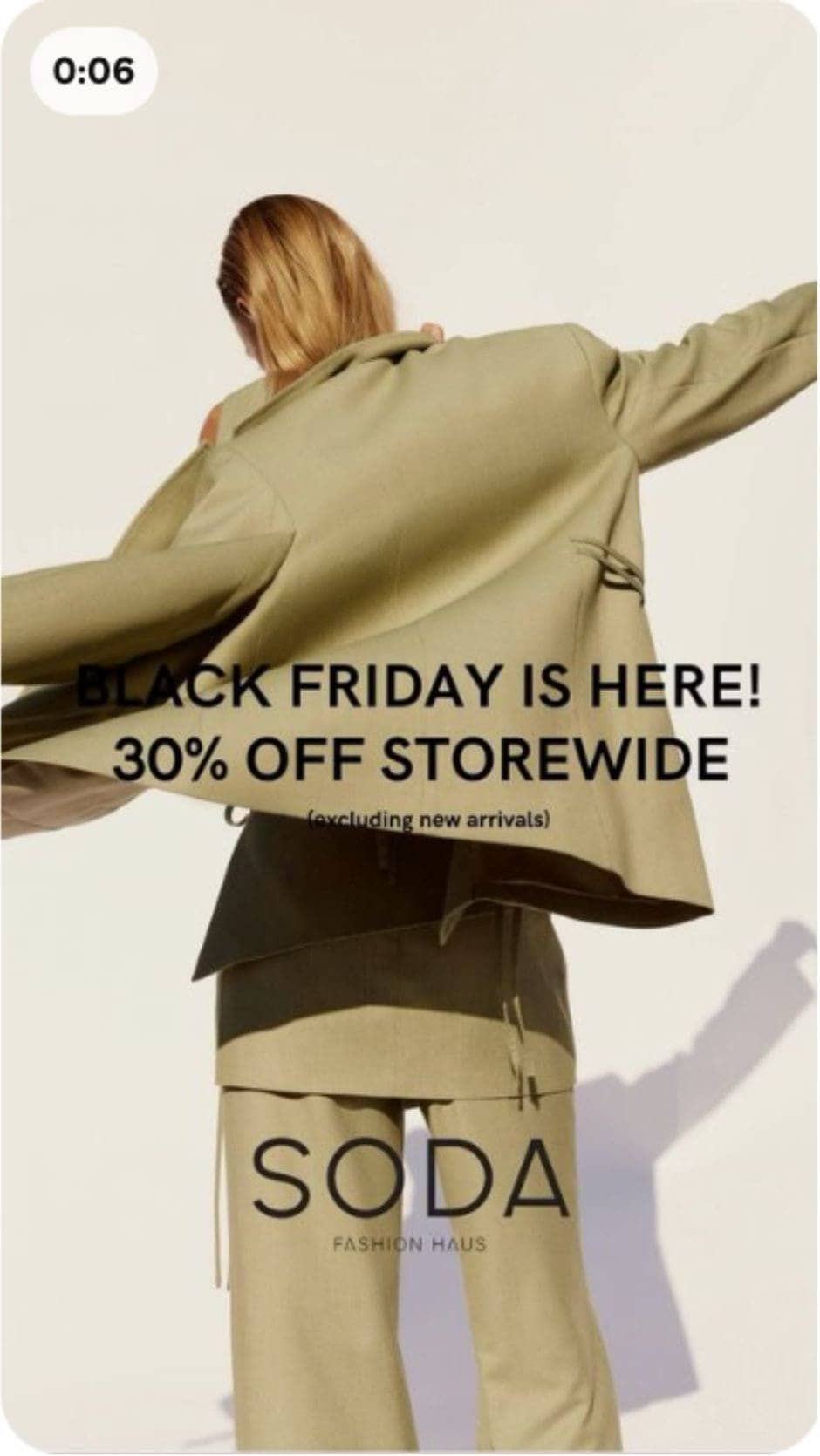 Model in beige suit with text Black Friday 30% off storewide. Example of Pinterest Black Friday marketing strategy for fashion brands driving urgency and sales.