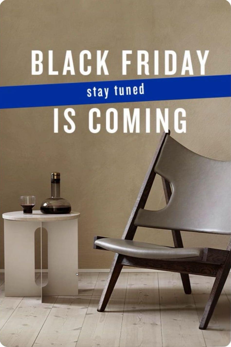 Modern chair and table with text Black Friday is coming. Pinterest Black Friday marketing strategy showcasing home decor promotion with anticipation messaging.