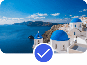 Pinterest Account Management example showing coastal Santorini architecture with blue domes and sea views, representing travel-focused discovery supported by a professionally structured Pinterest Account Management strategy.