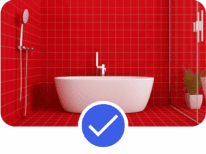 Pinterest Advertising example showing modern white freestanding bathtub against bold red tiled bathroom wall, illustrating strong visual contrast and scroll-stopping creative suited to Pinterest Advertising campaigns.