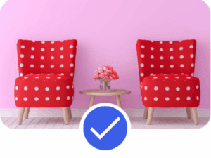 Pinterest Advertising example showing two red polka-dot chairs with small table and flowers against pink wall, illustrating bold lifestyle creative suitable for high-impact Pinterest Advertising visuals.