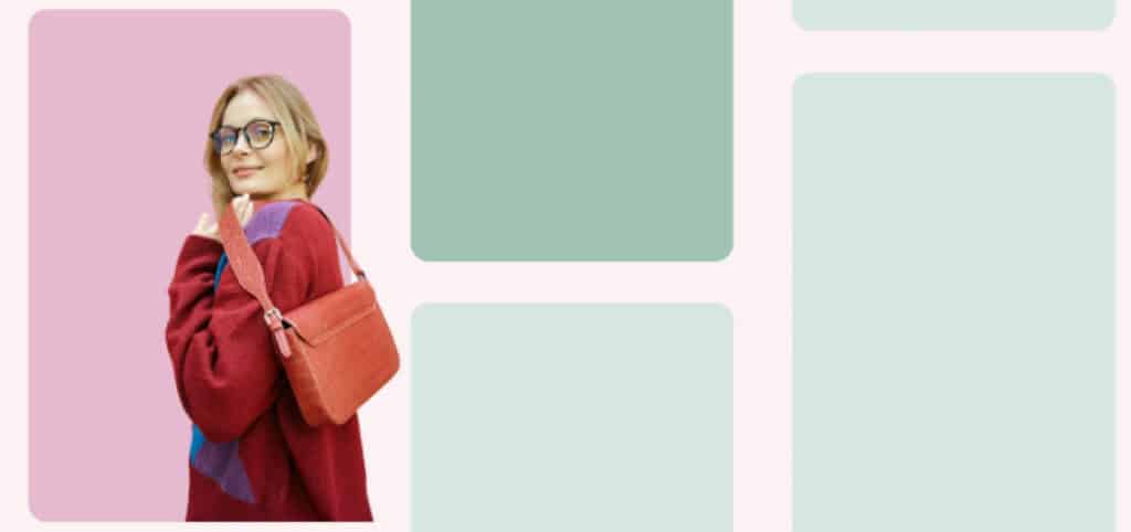 Woman wearing glasses and a red jumper holding a coral handbag against a soft pink background. Stylish lifestyle image for a Pinterest News header, highlighting fashion trends, visual inspiration, and curated content for modern brands and creators.